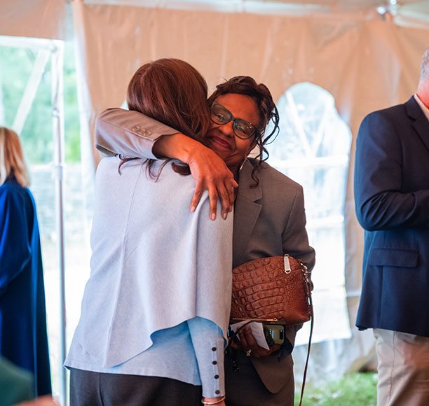 Photo of two people hugging. Link to What to Give. what.jpg